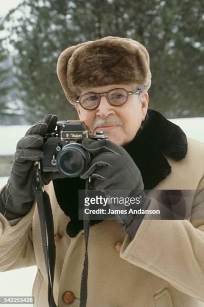 Marcel Dassault, at 89, taking a picture during his habitual winter holiday in Gstaad. Dassault, born Bloch, is the founder and CEO of the Groupe...