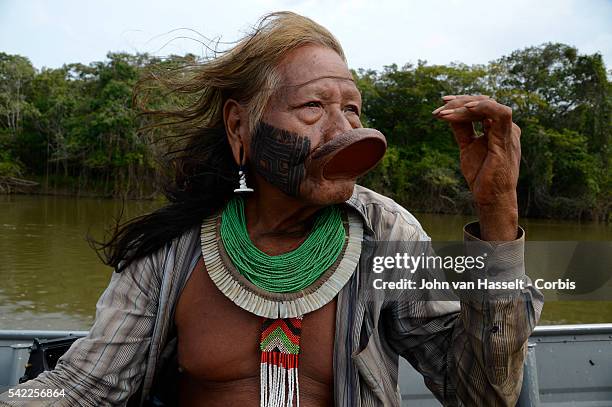 Indian Chief Raoni Metuktire of the Kayapo tribe in the Amazon prepares to leave his village for a trip to Europe to campaign against the...