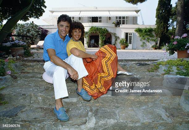 French singer Sacha Distel on holiday with his wife Francine at their house in Le Rayol on the French Riviera. | Location: Le Rayol, Var, France.