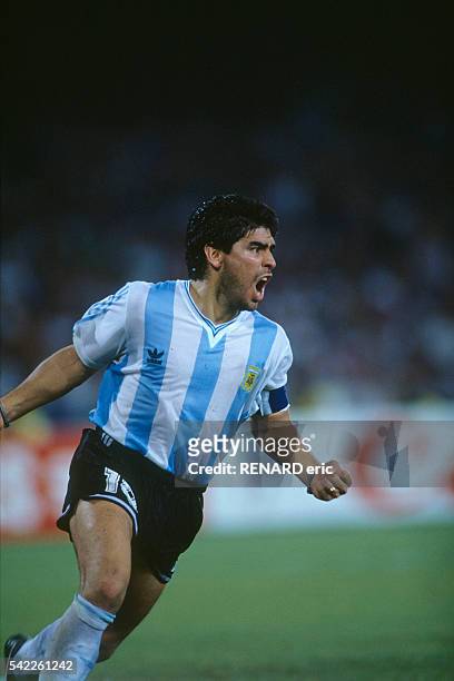 Diego Maradona celebrates victory over Italy during the semi-finals of the 1990 FIFA World Cup.
