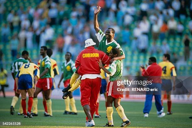 Roger Milla celebrates victory at the end of a first round match of the 1990 FIFA World Cup against Romania. Cameroon won 2-1.