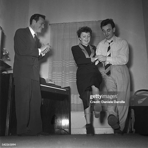 American singer and actor Eddie Constantine, and French singer Edith Piaf dancing with singer and songwriter of Armenian origin Charles Aznavour.