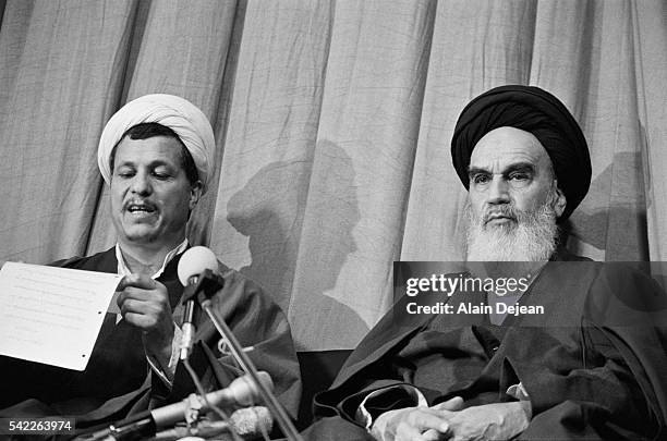 Ayatollah Ruhollah Khomeini with Ali Akbar Hashemi Rafsanjani as the new government is presented after the Iranian Revolution.