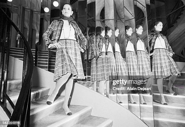 Model wears an outfit designed by Chanel during the 1972 Spring/Summer fashion collection.