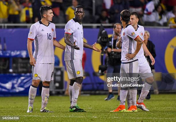 Daniel Torres and Cristian Zapata of Colombia look dejected after losing the Semifinal match between Colombia and Chile at Soldier Field as part of...