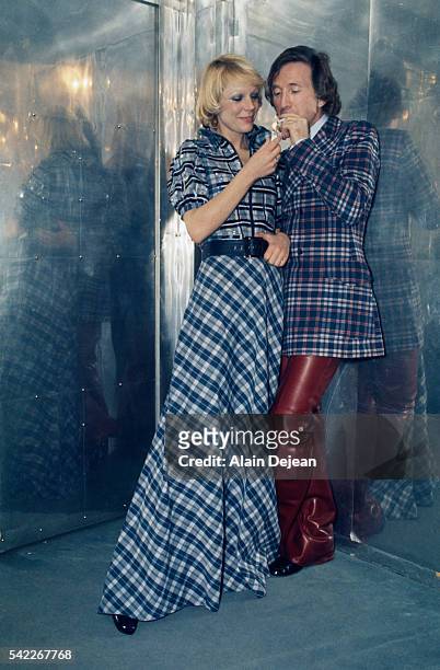 French designer Ted Lapidus with a model wearing his 1973 spring-summer collection.