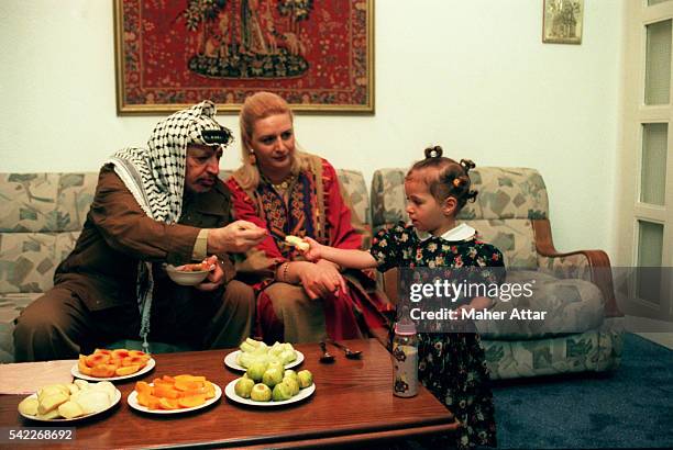 The Arafat family at home in Gaza City enjoying some fruit.