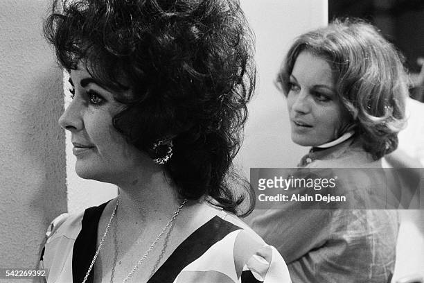 Austrian-born German actress Romy Schneider and British-born American actress Elizabeth Taylor visiting her husband Welsh actor Richard Burton on the...