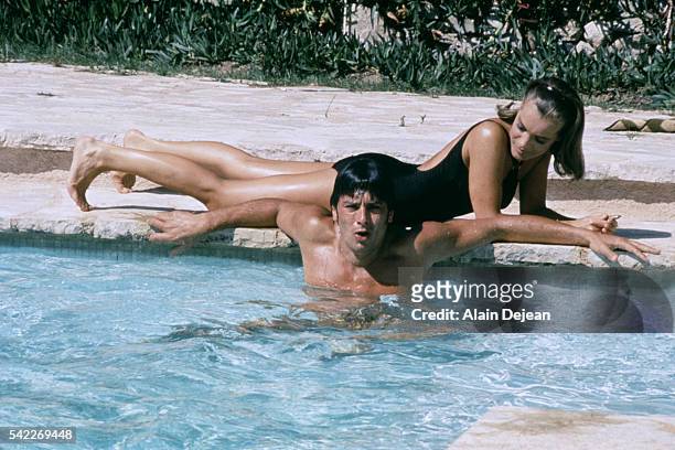 French actor Alain Delon and Austrian-born German actress Romy Schneider on the set of La Piscine, directed by Jacques Deray.