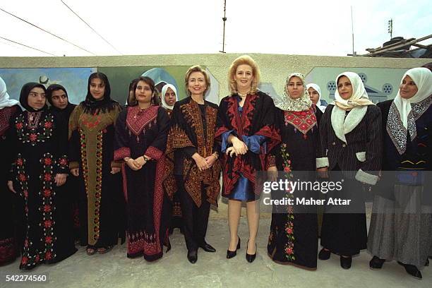 Arafat, H.Clinton with wives of the UNRAW, a UN agency for Palestinian refugees.