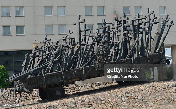 Side view of the monument to the Fallen and Murdered in the East. The statue with the load crosses includes Jewish tombstone and headstone Muslim,...