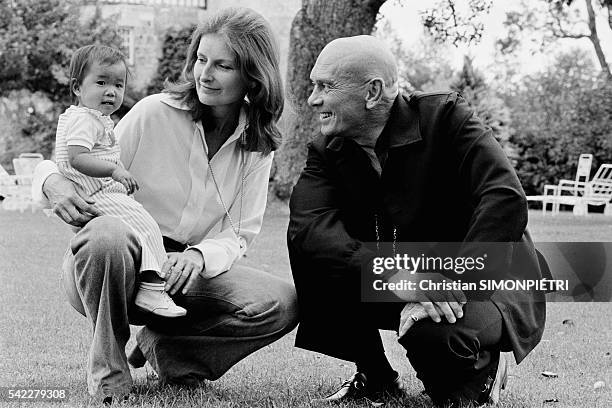 Russian-born American actor, Yul Brynner, with his third wife, Jacqueline de Croisset, and his recently adopted Vietnamese orphan, Mia at their...