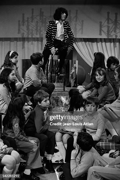 French singer Julien Clerc on the set of television show Sacha Show, hosted by Sacha Distel.