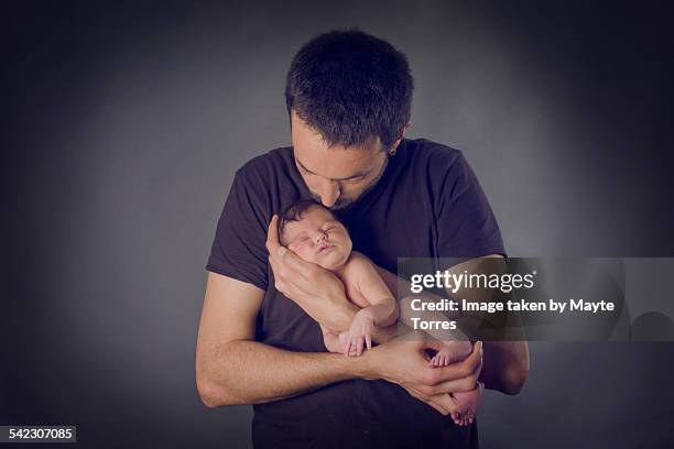 160 Man Rocking Baby Stock Photos, High-Res Pictures, and Images ...