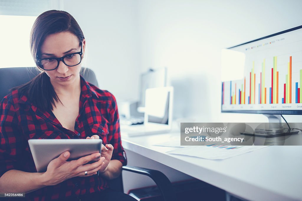 Businesswoman using tablet