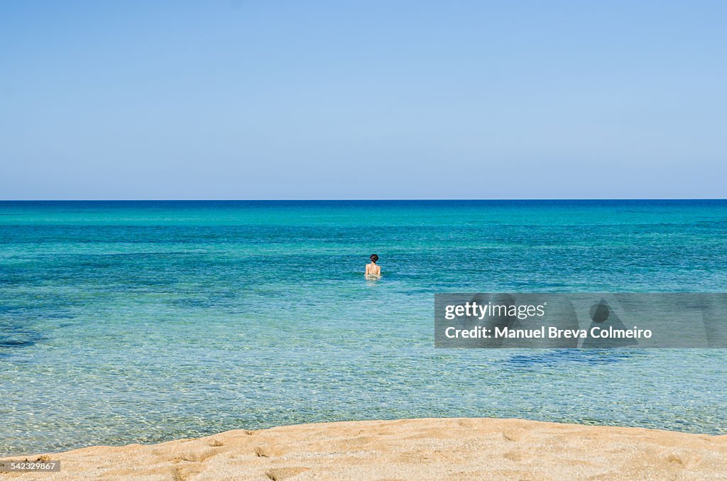 A girl swimming in the sea