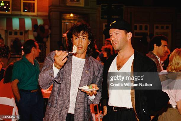 American actor, director, screenwriter and producer Sylvester Stallone and actor Bruce Willis attend Demi Moore's 30th birthday party at Six Flags...