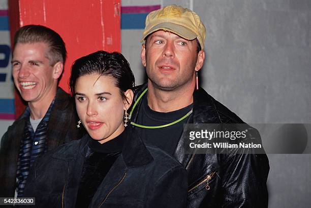 American actress Demi Moore and her husband, actor Bruce Willis attend Moore's 30th birthday party celebration at Six Flags Magic Mountain amusement...