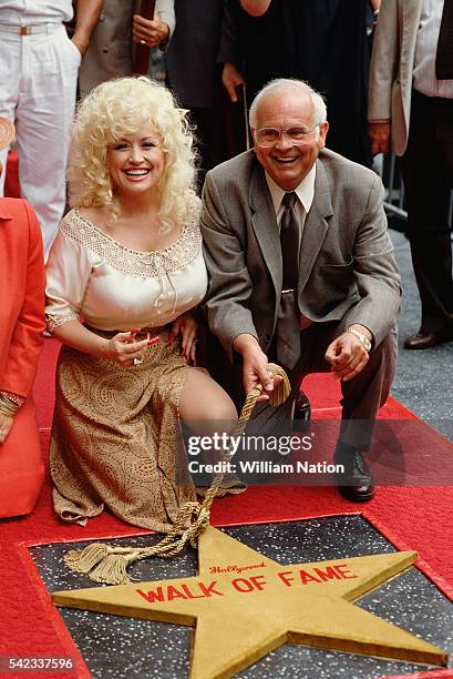 American country music singer and songwriter Dolly Parton receives a star on the Holywood Walk of Fame.