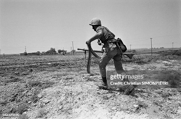 Turkish commando takes up his combat position 500m from Nicosia airport and the Greek frontline. Turkish forces landed on the island on July 20, 1974.