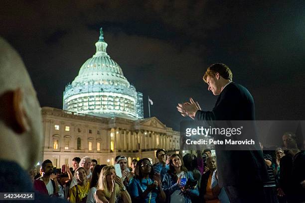 June 23: Rep. Joe Kennedy III applauds supporters of House Democrats taking part in a sit-in on the House Chamber outside the U.S. Capitol on June...