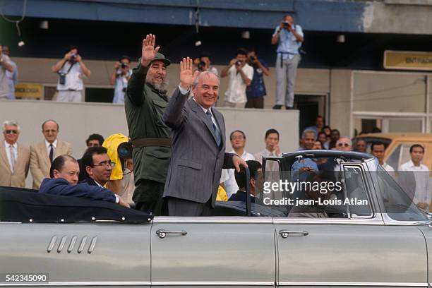 Cuban President Fidel Castro welcomes the Head of state of the Soviet Union Mikhail Gorbachev with a parade during his official visit to Cuba.