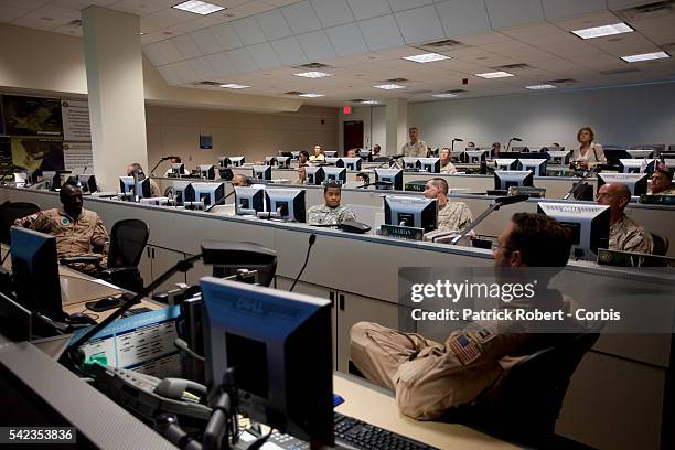 The Joint Operations Center , from where all current conflicts are commanded at the United States Central Command . Computer screens are shut down...