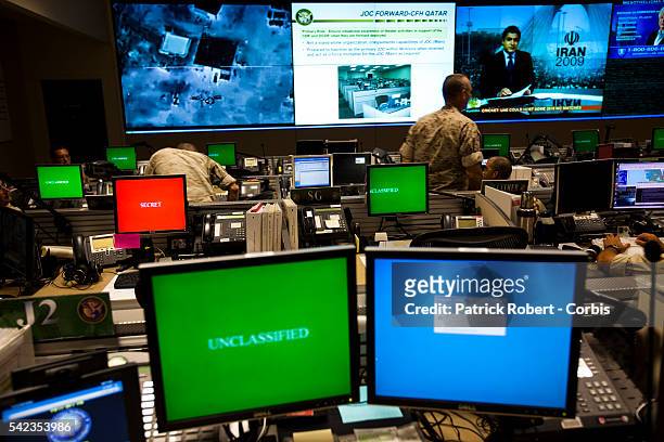 The Joint Operations Center , from where all current conflicts are commanded at the United States Central Command . Computer screens are shut down...