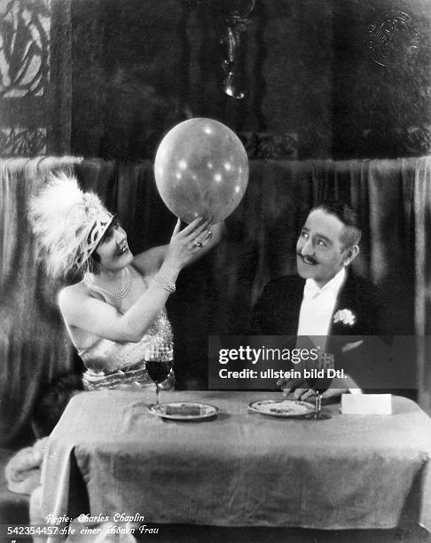 Purviance, Edna - Actress, USA - *21.10.1895-+ Scene from the movie 'A Woman of Paris: A Drama of Fate' with Adolphe Menjou Directed by: Charles...