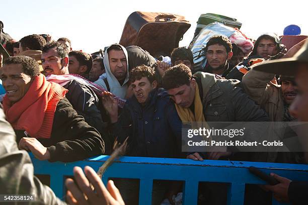 Refugee crisis is looming on the Libyan-Tunisian border as thousands desesperate foreign workers try to escape Libya. Many tens of thousands more are...