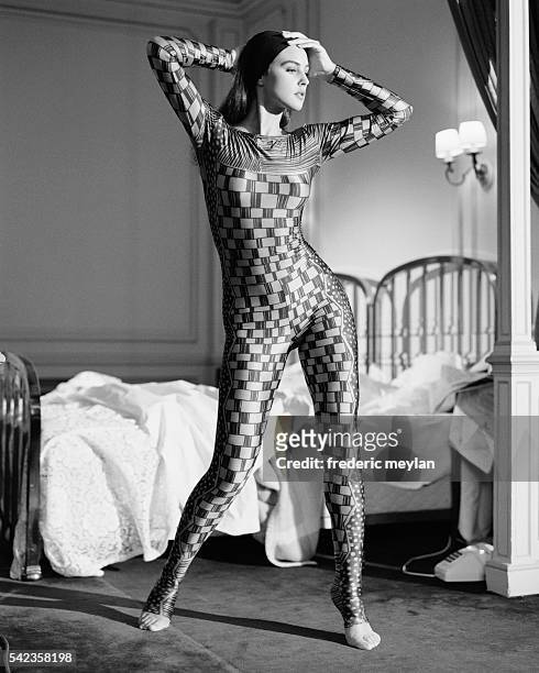 Italian actress and model Monica Bellucci wears a body stocking designed by Issey Miyake.