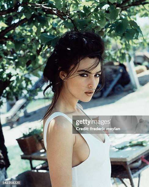 Italian actress and model Monica Bellucci at home in Rome, 6th June 1991.