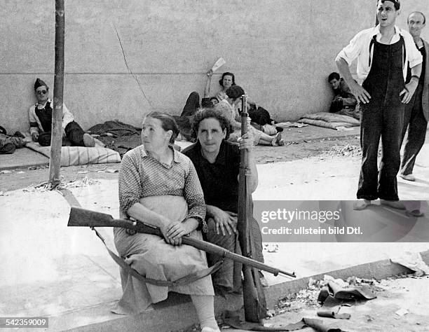 Spain Catalonia Barcelona Spanish Civil War: Women soldiers for the Republicans armed with rifles in the streets of Barcelona at the beginning of the...