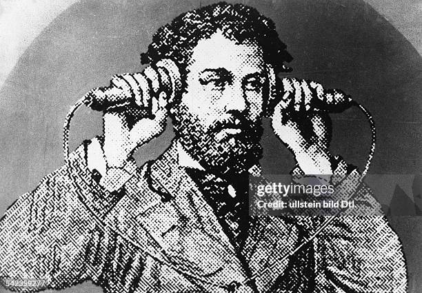 Alexander Graham Bell with the firrst telephone - about 1876