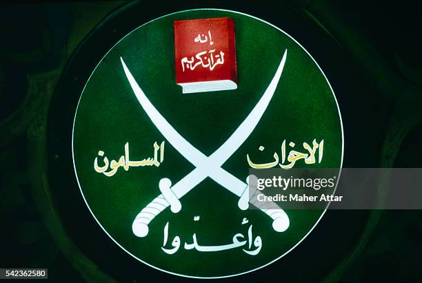 Emblem of the fundamentalist Islamic movement founded in 1928, Society of the Muslim Brothers, on display during a press conference in their Cairo...