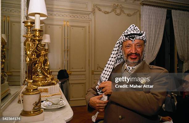 Yasser Arafat Putting on His Keffieh at the Crillon Hotel