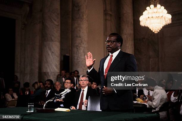 Supreme Court nominee Clarence Thomas participates in his Senate confirmation hearings.