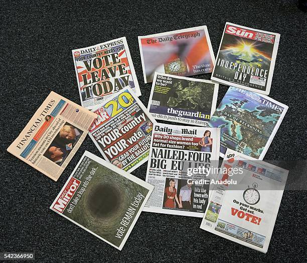 Headlines on EU referendum day are seen on the front pages of the newspapers as voters go to the polls in the EU referendum in London, United Kingdom...