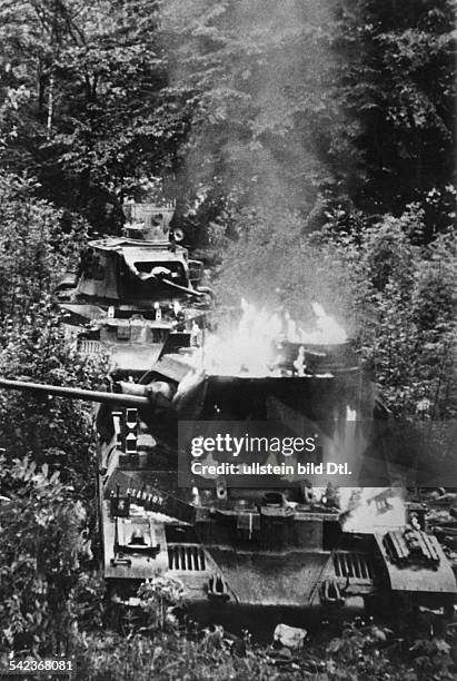 Ww: campaign in the west 1940, german advance towards Dunkirk: burning british tanks . .