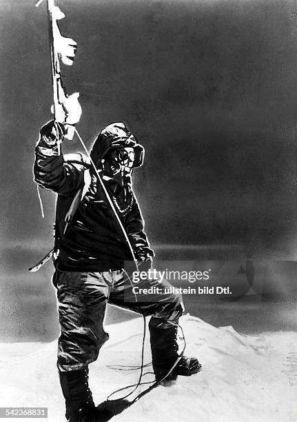 NThe sherpa guide, Tenzing Norgay, at the peak of Mount Everest. Norgay, with Sir Edmund Hillary, was part of the first expedition to reach the...