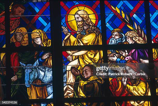 Detail shows Houphouet Boigny, former president and commissioner of the basilica, with Jesus Christ on his entry into Jerusalem. | Detail of: 'Entry...