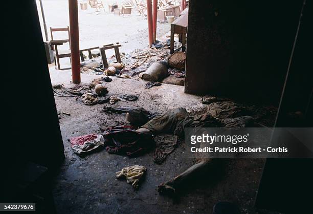 Corpse rots on the floor of St. Peter's Lutheran Church in Monrovia, a vicitm of a brutal massacre. On July 29 troops from President Samuel Doe's...
