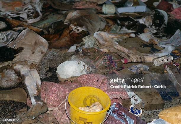 Corpses rot on the floor of St. Peter's Lutheran Church in Monrovia, victims of a brutal massacre. On July 29 troops from President Samuel Doe's...