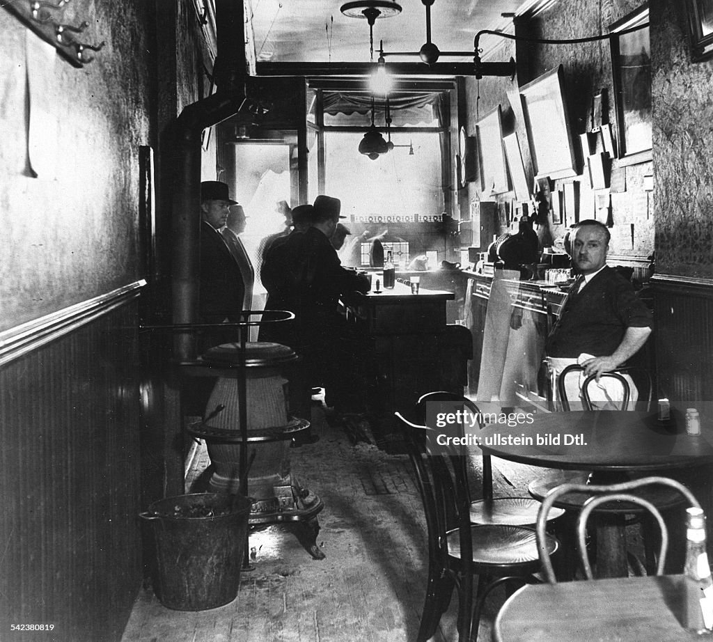 NEW YORK: SPEAKEASY, 1932. Interior of a speakeasy during Prohibition on the East Side of New York. Photographed 1932.