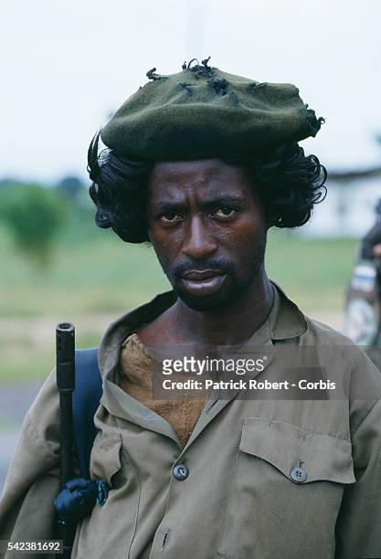 Soldier goes on patrol in Monrovia during the Liberian Civil War. In 1989, Charles Taylor, leader of the NPFL , launched a revolt against the regime...
