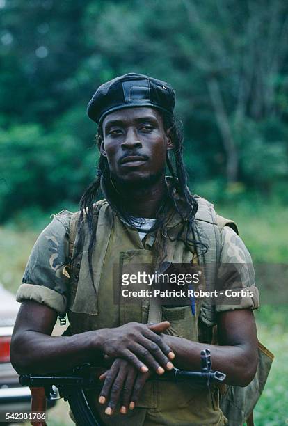 Soldier of the United Liberation Movement of Liberia for Democracy holds his rifle in Monrovia during the Liberian Civil War. In 1989, Charles...