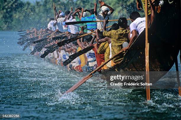 Race in Alappuzha region during the annual harvest festival Onam. Chundan Vallam, or snake boats, are over 100 feet long. About one hundred oarsmen...