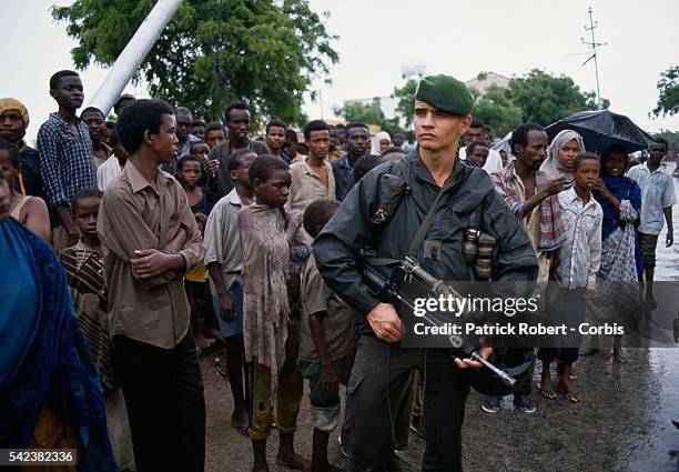 Members of the French Foreign Legion join the 28,000 United States Marines sent during Operation Restore Hope to protect relief workers, whose job...