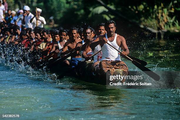 Race in Alappuzha region during the annual harvest festival Onam. Chundan Vallam, or snake boats, are over 100 feet long. About one hundred oarsmen...