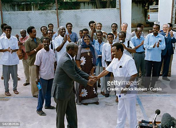 Rival Somalian leaders Ali Mahdi Mohammed and Mohammed Farrah Aidid shake hands at a peace treaty meeting in Mogadishu. With the end of President...